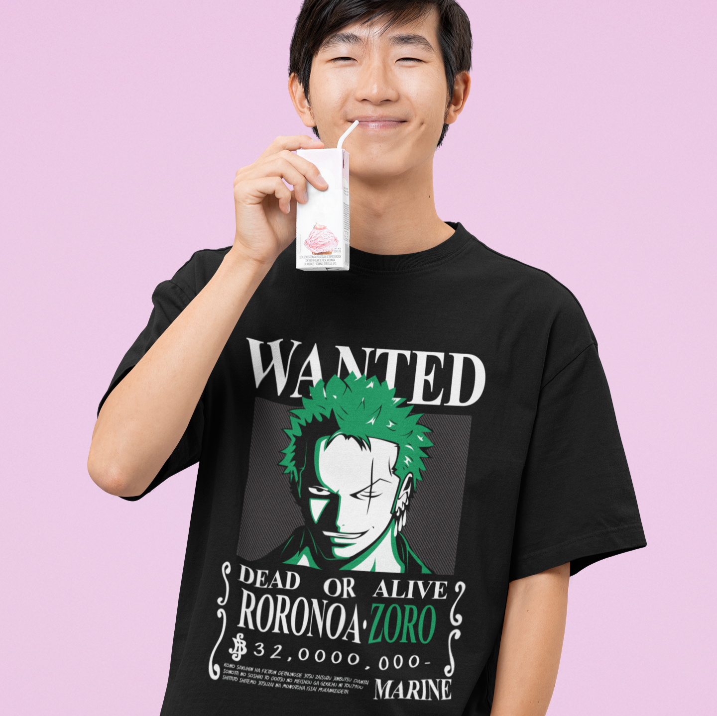 Happy man wearing One Piece Roronoa Zoro Wanted Poster Tee in black drinking from a juice box in a kawaii style.