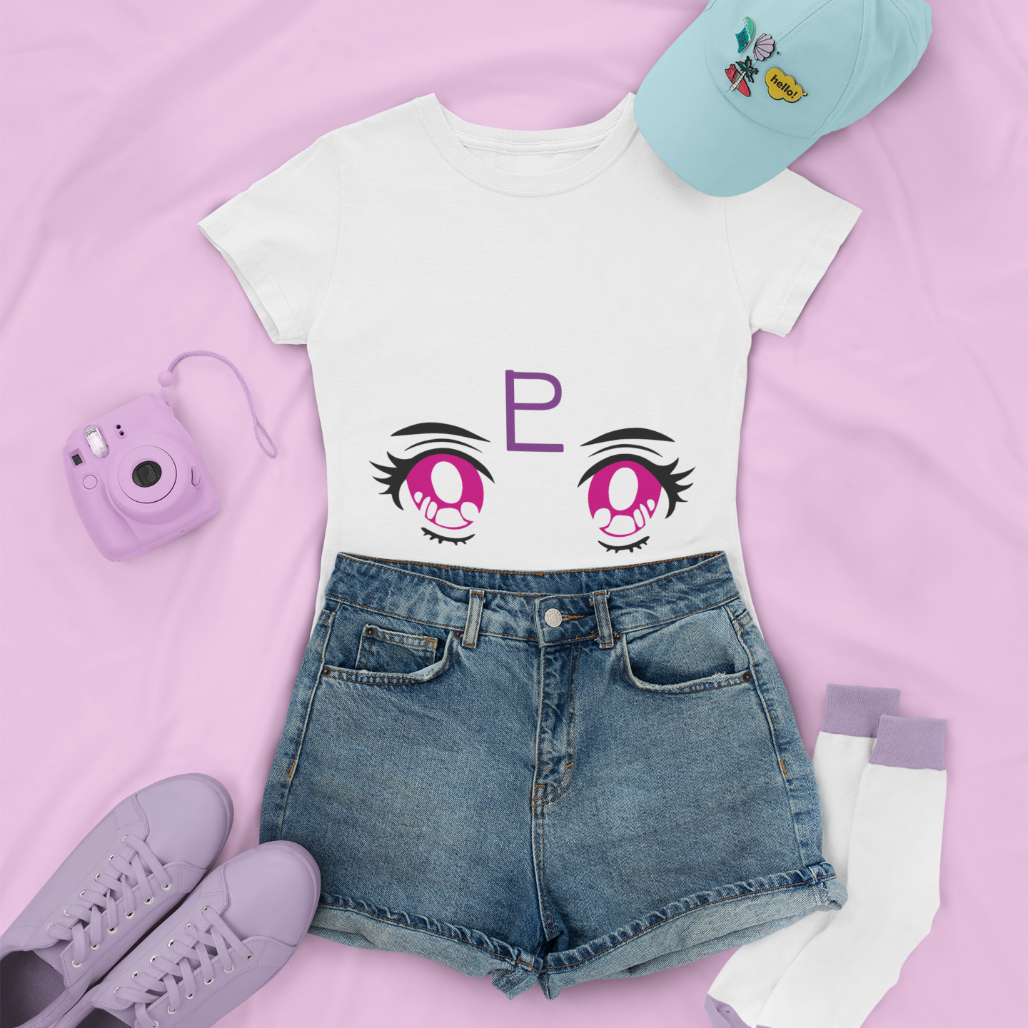 Sailor Pluto Transformation Eyes Tee in white with denim shorts, and low sneakers