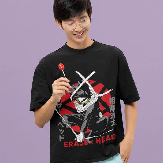 Happy man wearing Eraser Head Dynamic Pose Tee in black smiling with his hand behind his head.
