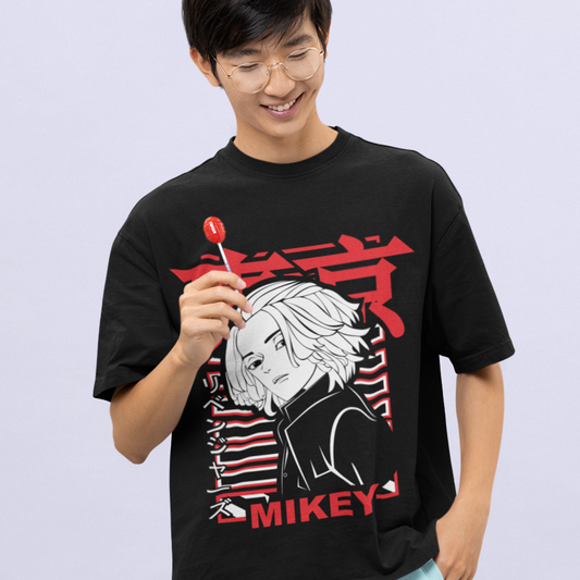 Happy man wearing Mikey Tokyo Revengers Tee in black smiling with his hand behind his head.