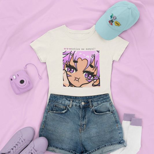 Notice Me Senpai Vtuber Hikari Silver Tee in natural with denim shorts, and low sneakers