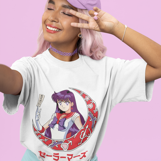 Closeup of woman wearing Sailor Mars Crescent Moon Tee in white with a kawaii-inspired outfit making a peace sign.