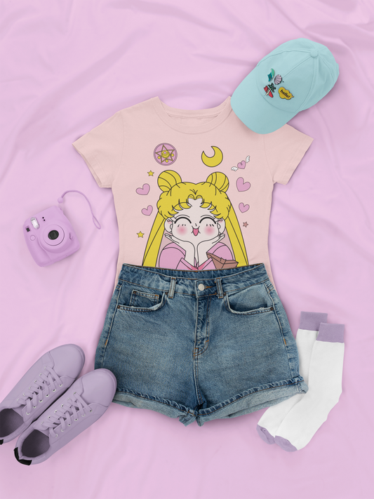 Sailor Moon Cute Expression Tee in pink with denim shorts, and low sneakers