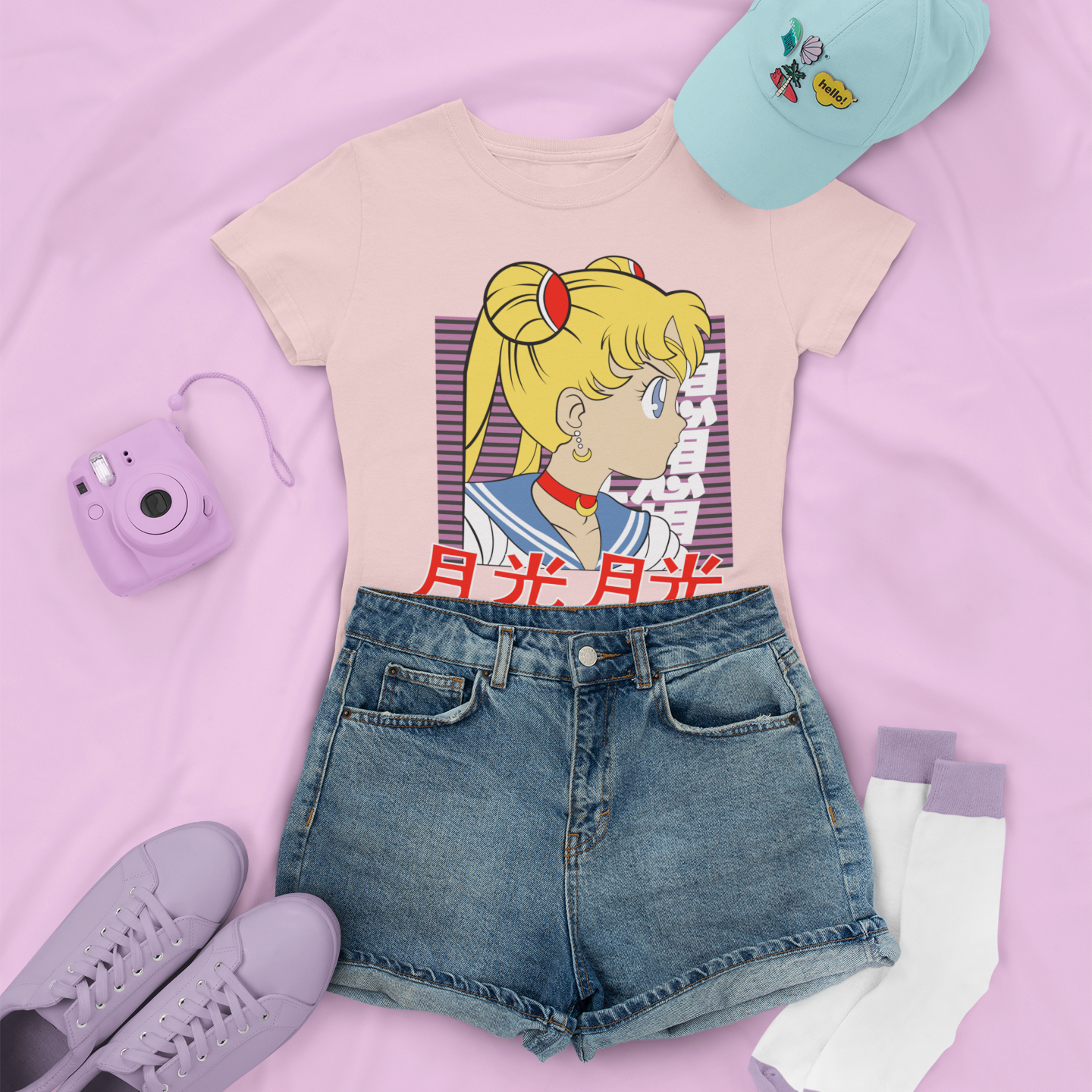 Sailor Moon Retro Profile Tee in pink with denim shorts, and low sneakers