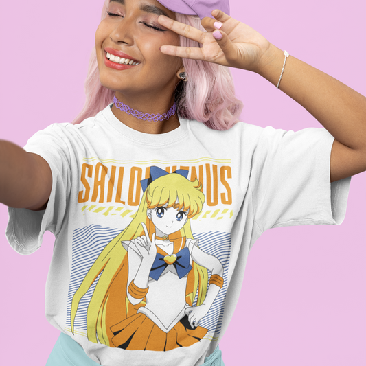 Closeup of woman wearing Sailor Venus Crystal Power Tee in white with a kawaii-inspired outfit making a peace sign.